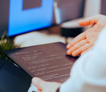 Modern mobile app development interface showing UI/UX design screens and coding environment representing app development companies in Lebanon by Sync